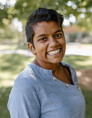 Headshot of Sitara Busby