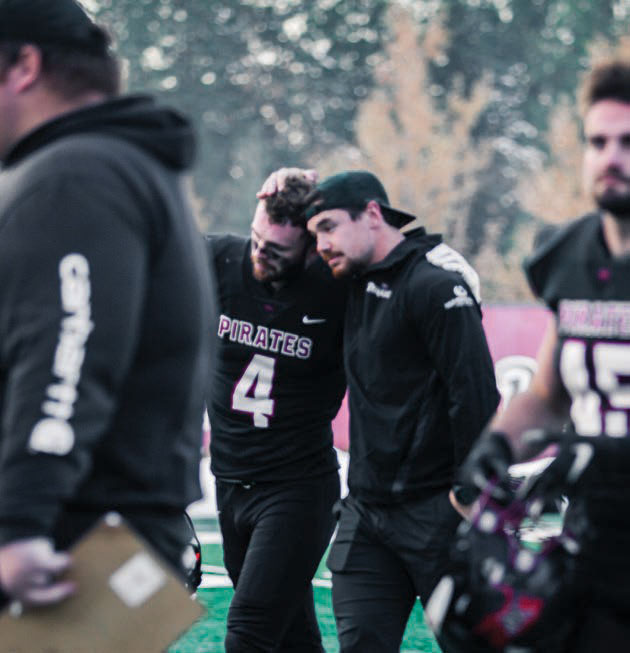 Football players on the sidelines