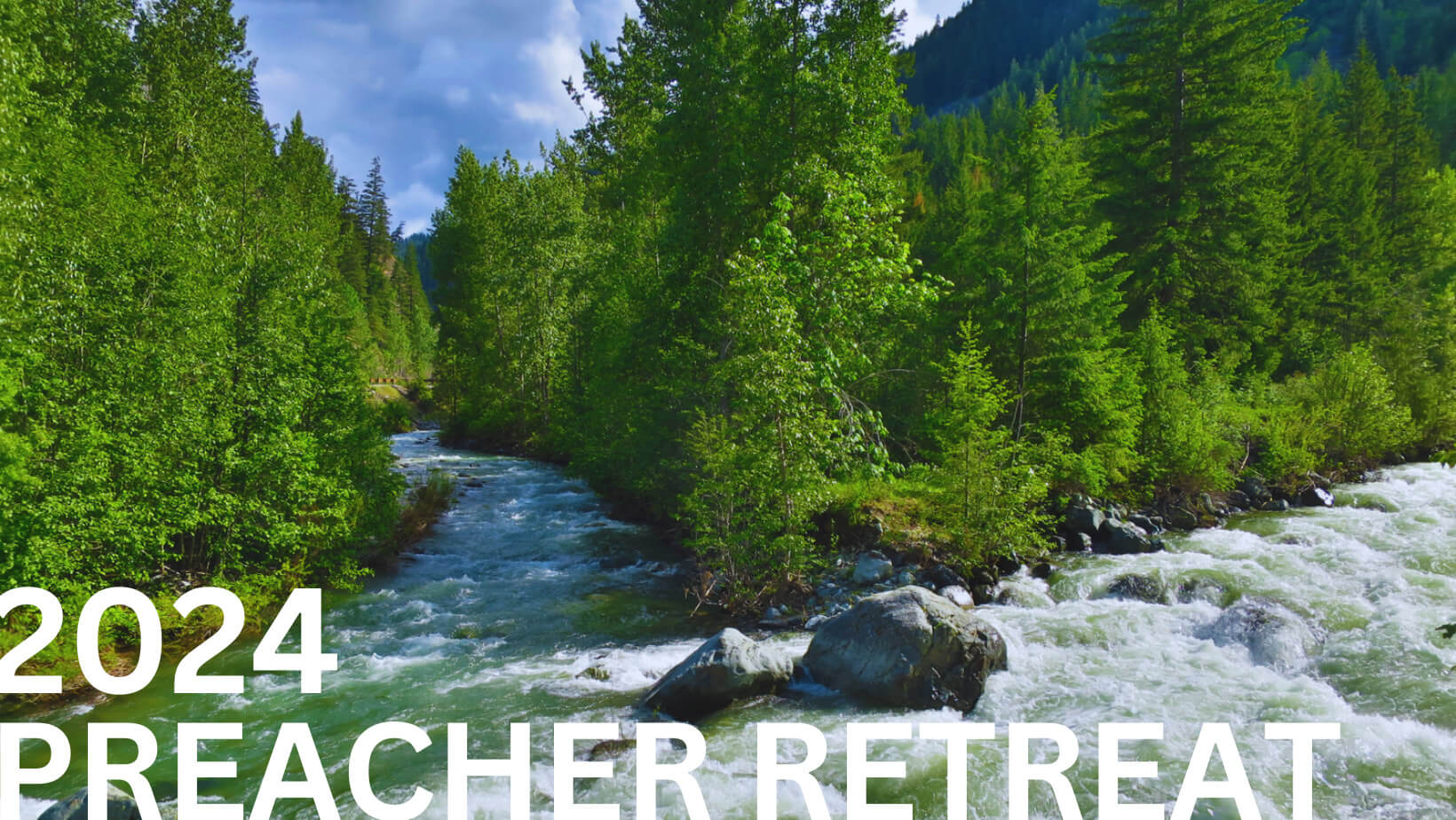A stream running through a narrow corridor of thick evergreen trees. Text over the image says,